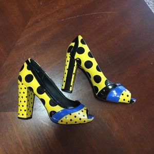 Yellow and black polka dot heels